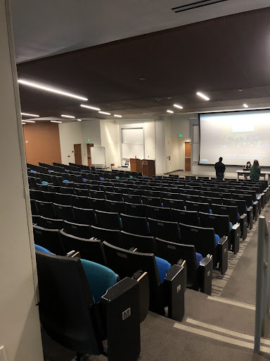 View from the back of a lecture hall of rows of seats