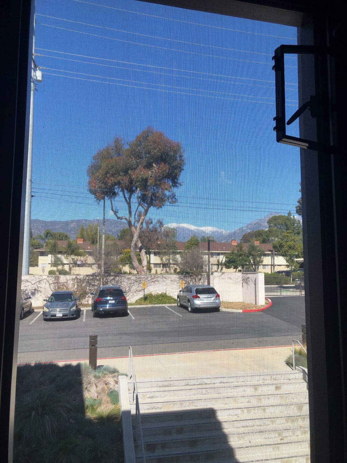 View of a parking lot with mountains