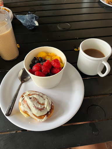 An acai bowl with fruit on it on a plate