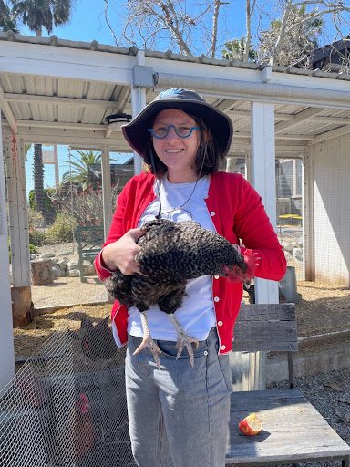 Audrey holding a chicken