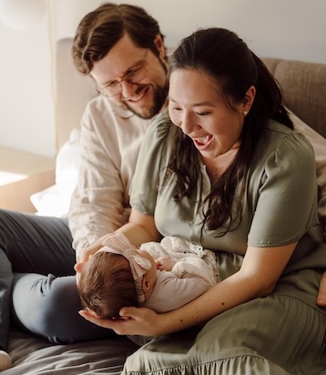 Clay Hambrick and Semmie Kim with baby