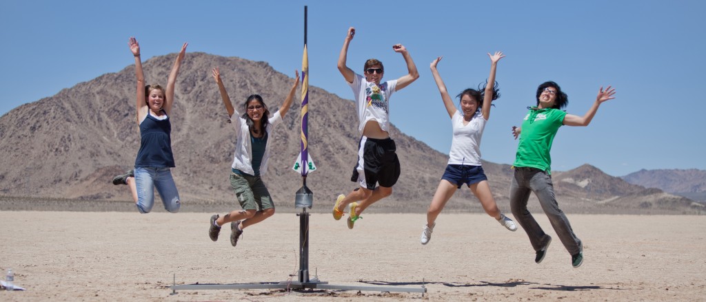 E 80 rocket with team jumping