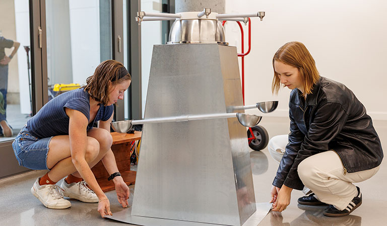 students with metal device