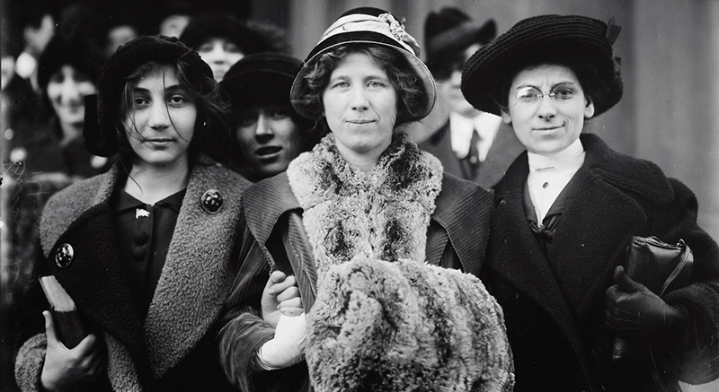 Photograph shows suffrage and labor activist Flora Dodge "Fola" La Follette, social reformer and missionary Rose Livingston, and a young striker during a garment strike in New York City in 1913. (Image source: Library of Congress Prints, Photographs Division)