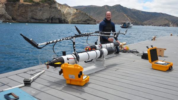 Dr. Chris Lowe with AUVs