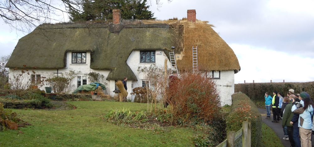 students look at british house