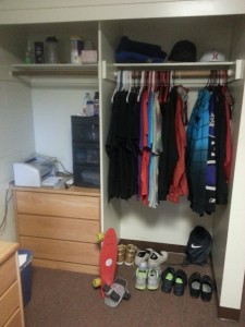 My closet, complete with my wardrobe of Giorgio Armani, Ralph Lauren, and J. Crew. By that I mean free t-shirts I have received from various events at Mudd and my thrift store dress clothing.